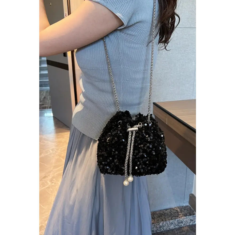 Sparkle in Style with Yeppi Sequin Chain Drawstring Bucket Bag