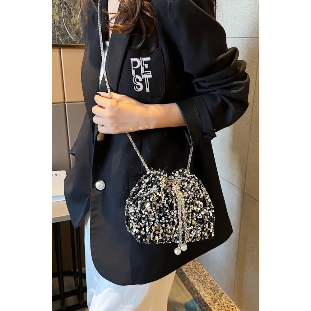 Sparkle in Style with Yeppi Sequin Chain Drawstring Bucket Bag