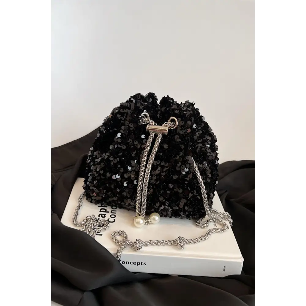 Sparkle in Style with Yeppi Sequin Chain Drawstring Bucket Bag