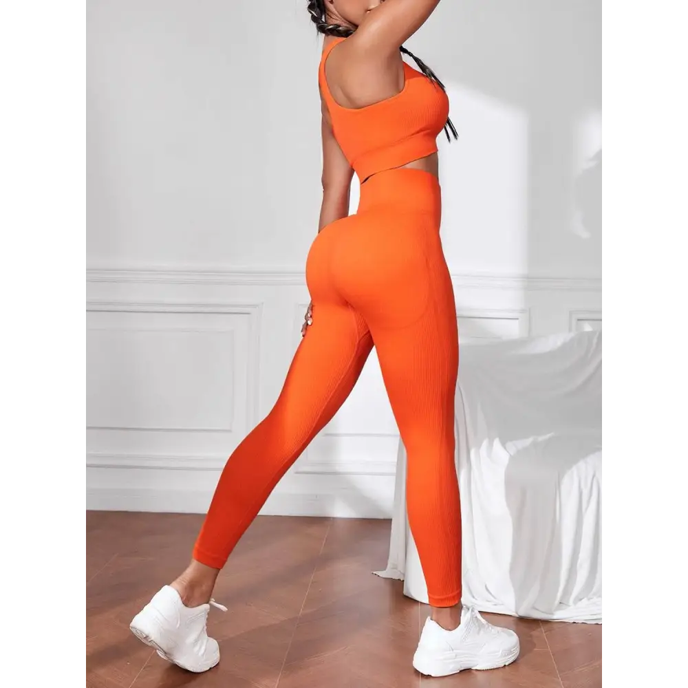 Qstyle Sport Tank and Leggings Set Energizes Your Workout