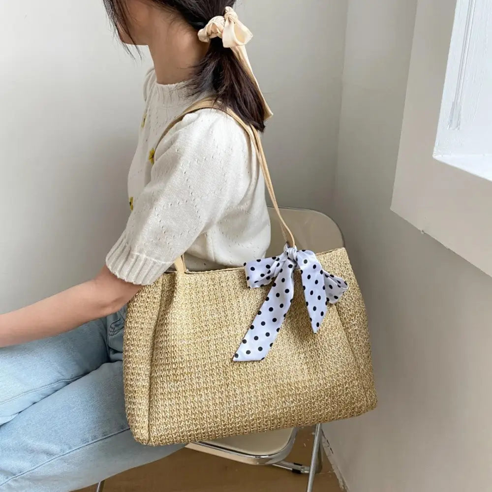 Chic Straw Woven Leather Strap Handbag with Polka Dot Charm