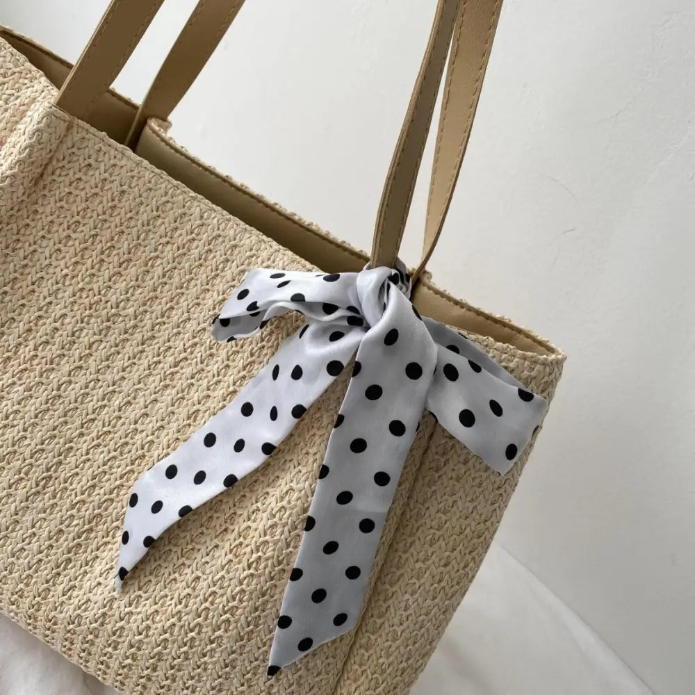 Chic Straw Woven Leather Strap Handbag with Polka Dot Charm