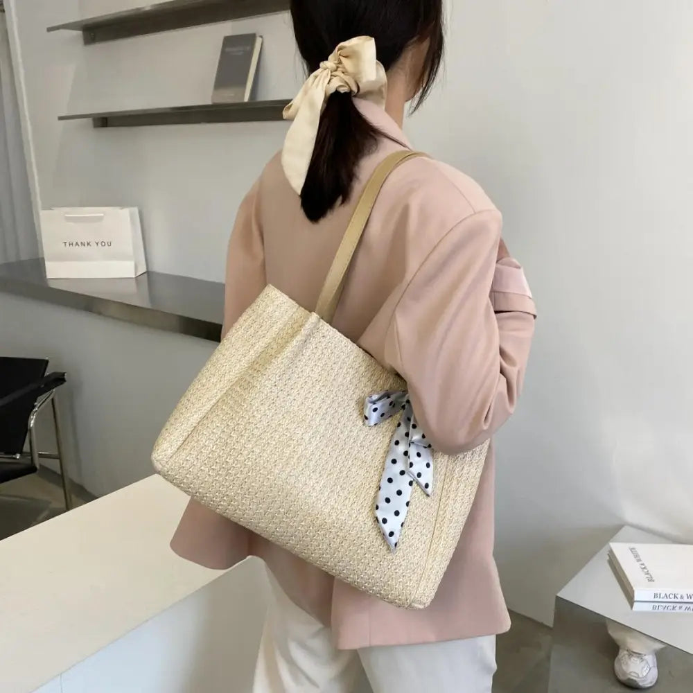 Chic Straw Woven Leather Strap Handbag with Polka Dot Charm