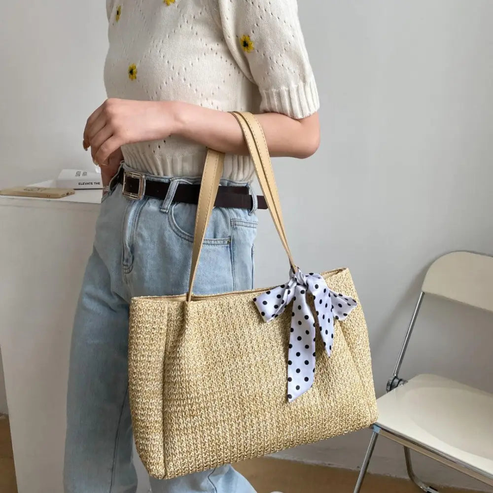 Chic Straw Woven Leather Strap Handbag with Polka Dot Charm