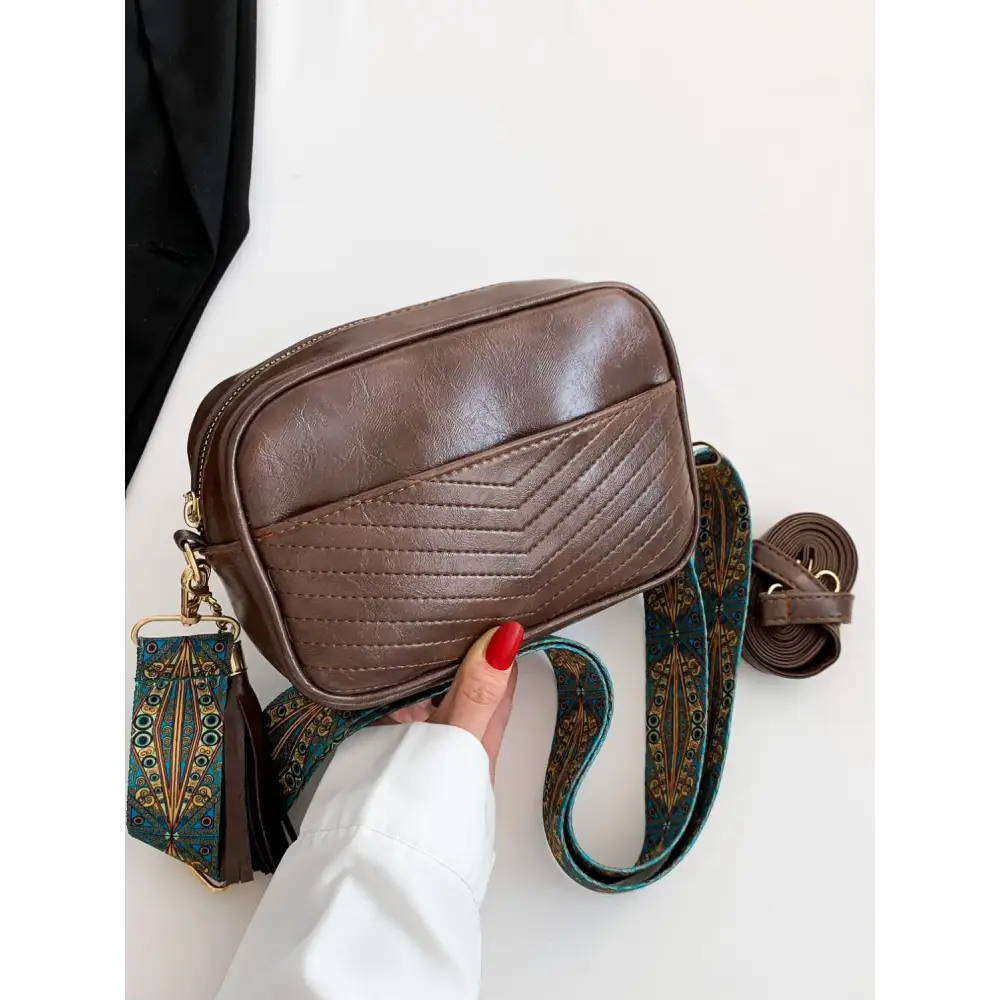 Stylish Brown Leather Crossbody Bag with Trendy Printed Strap Cassette