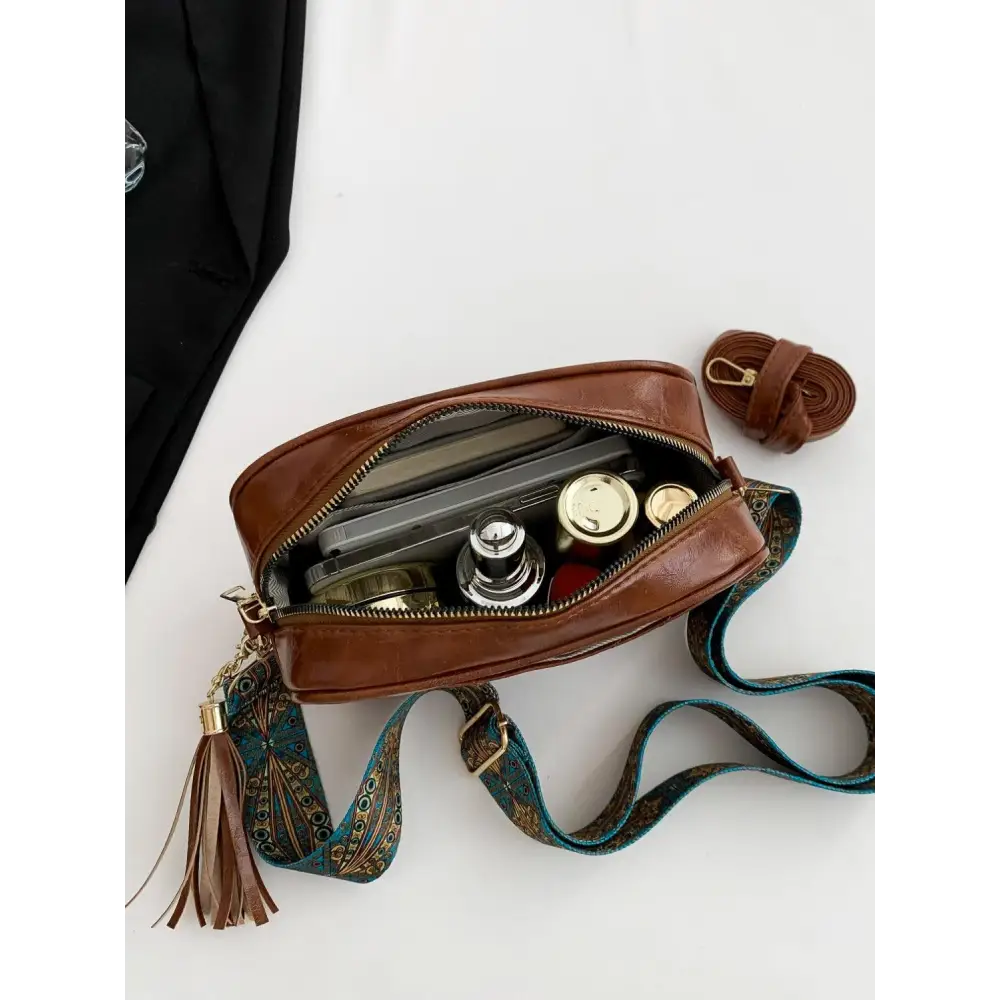 Stylish Brown Leather Crossbody Bag with Trendy Printed Strap Cassette