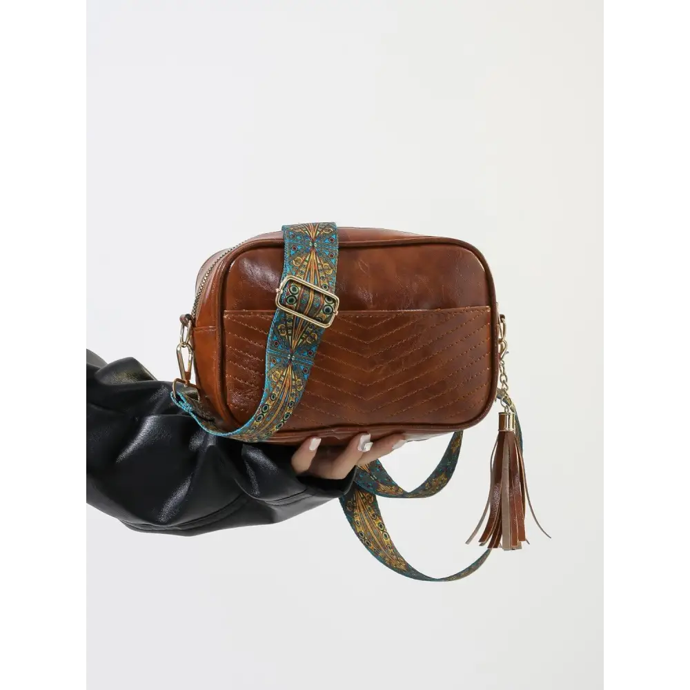 Stylish Brown Leather Crossbody Bag with Trendy Printed Strap Cassette