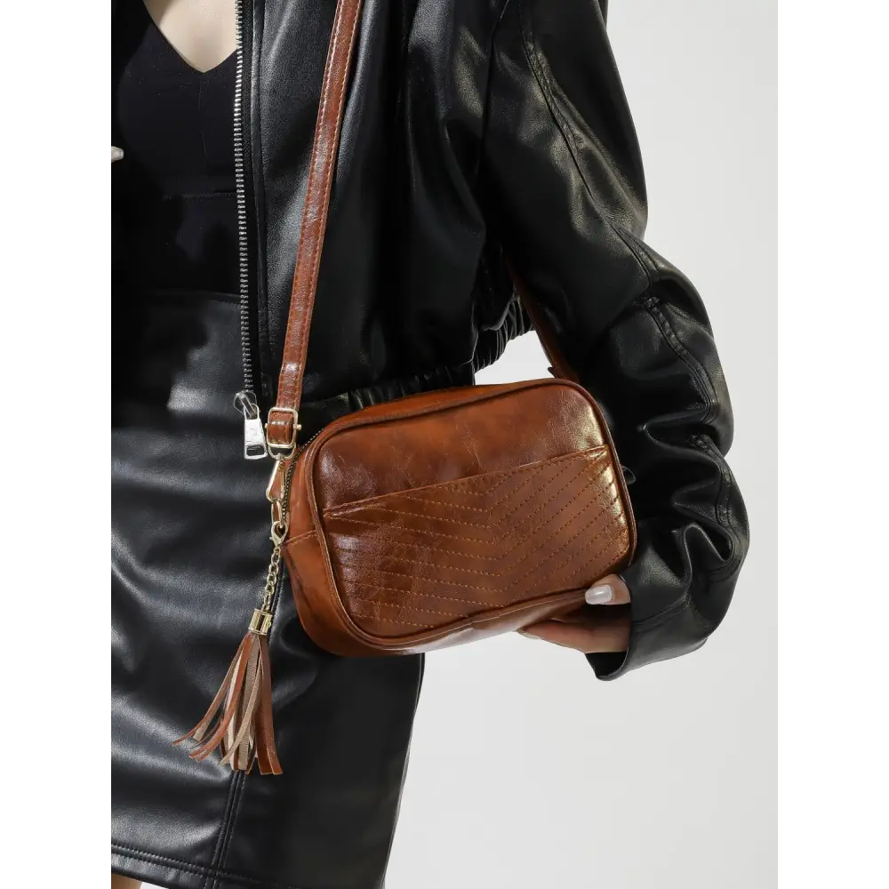 Stylish Brown Leather Crossbody Bag with Trendy Printed Strap Cassette