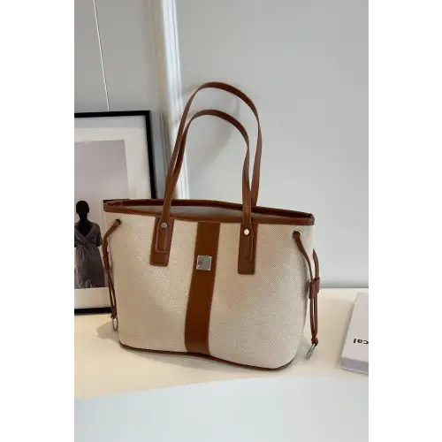 Stylish Leather Tote Bag with Chic Brown Accents